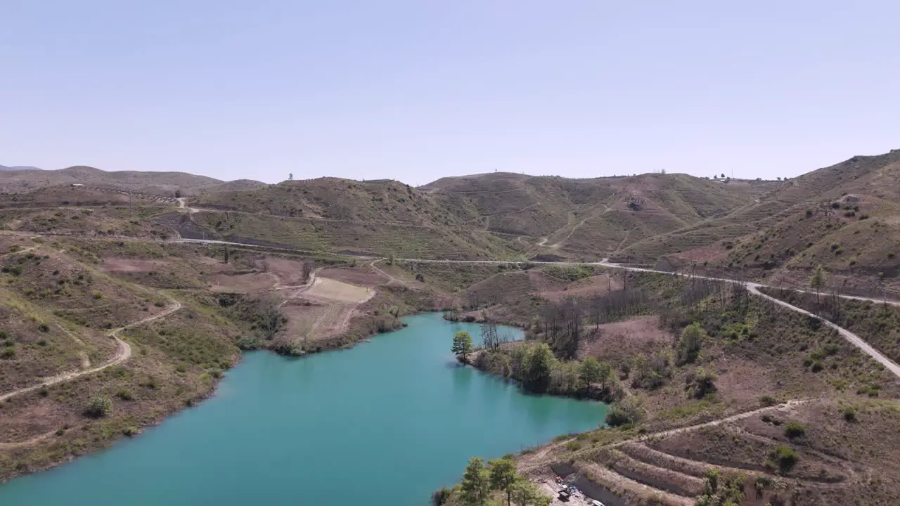 Green lake Taurus mountains Turkey aerial establishing overview