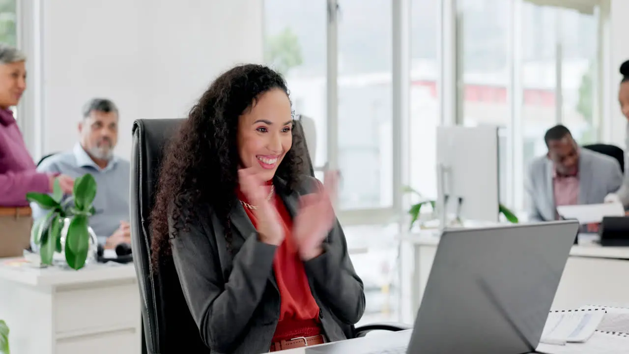 Woman in office with laptop