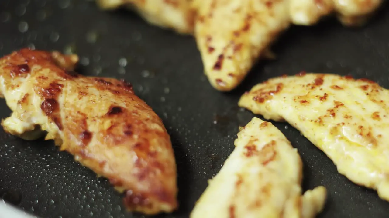 Garlic fried chicken fillet on pan