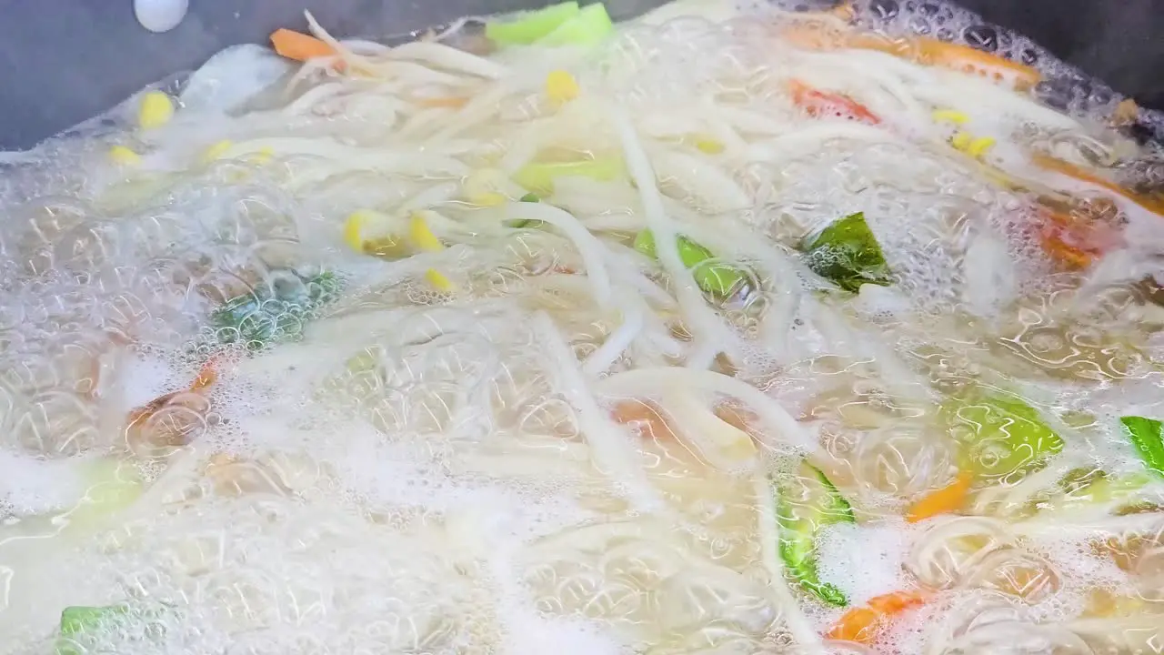 Seafood Kalguksu Boiling in Pot Korean Knife Cut Noodle Soup