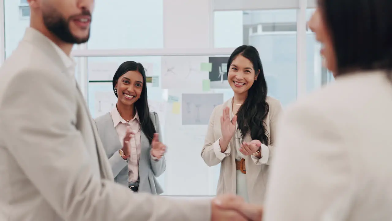 Businessman handshake and applause in promotion