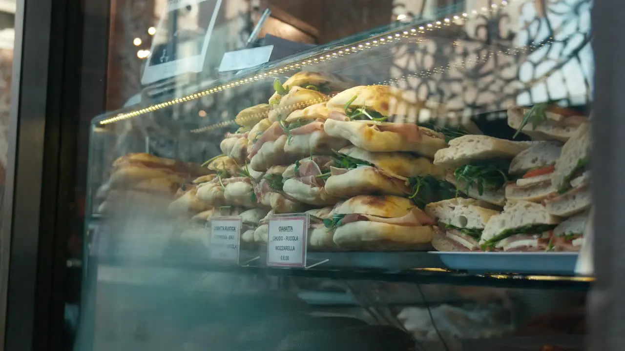 Venetian window display of typical assorted sandwiches