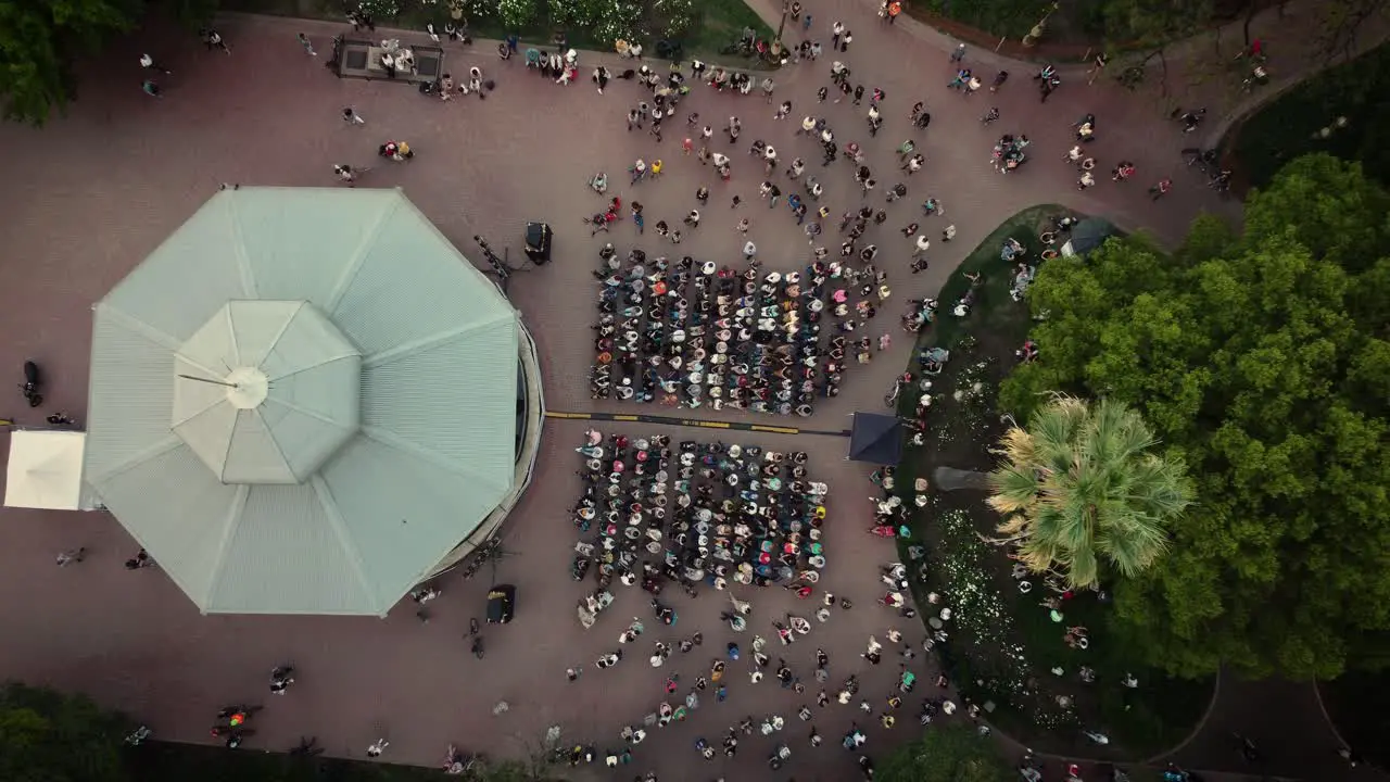 4K 30FPS Drone View of People at an Outdoor Concert in Park in Buenos Aires Boom Shot