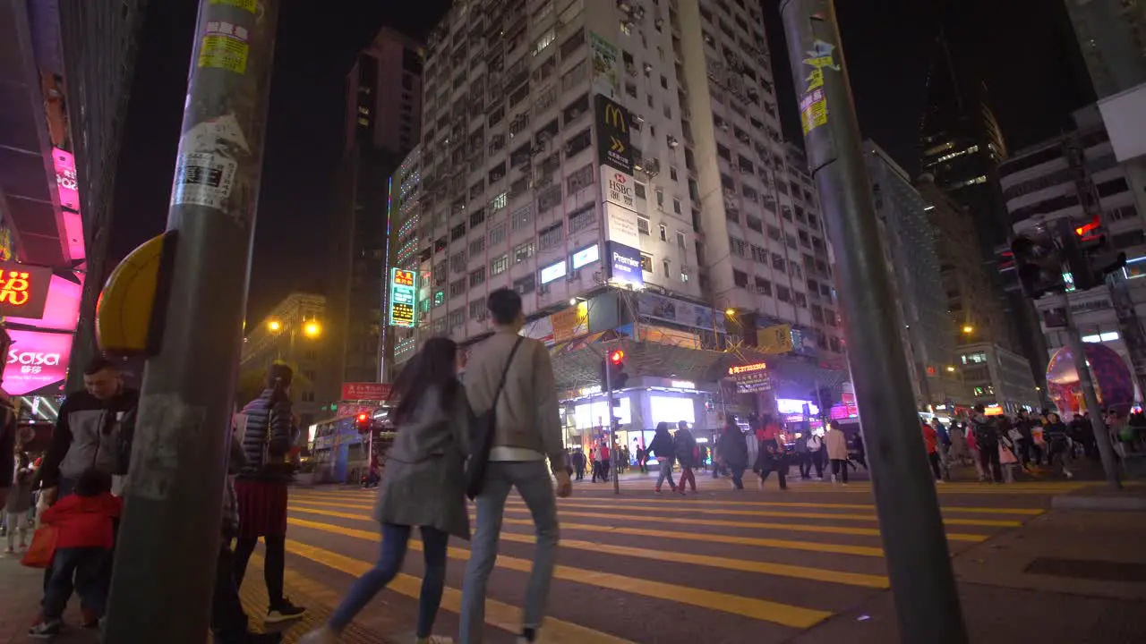 People at a Crosswalk in Hong Kong