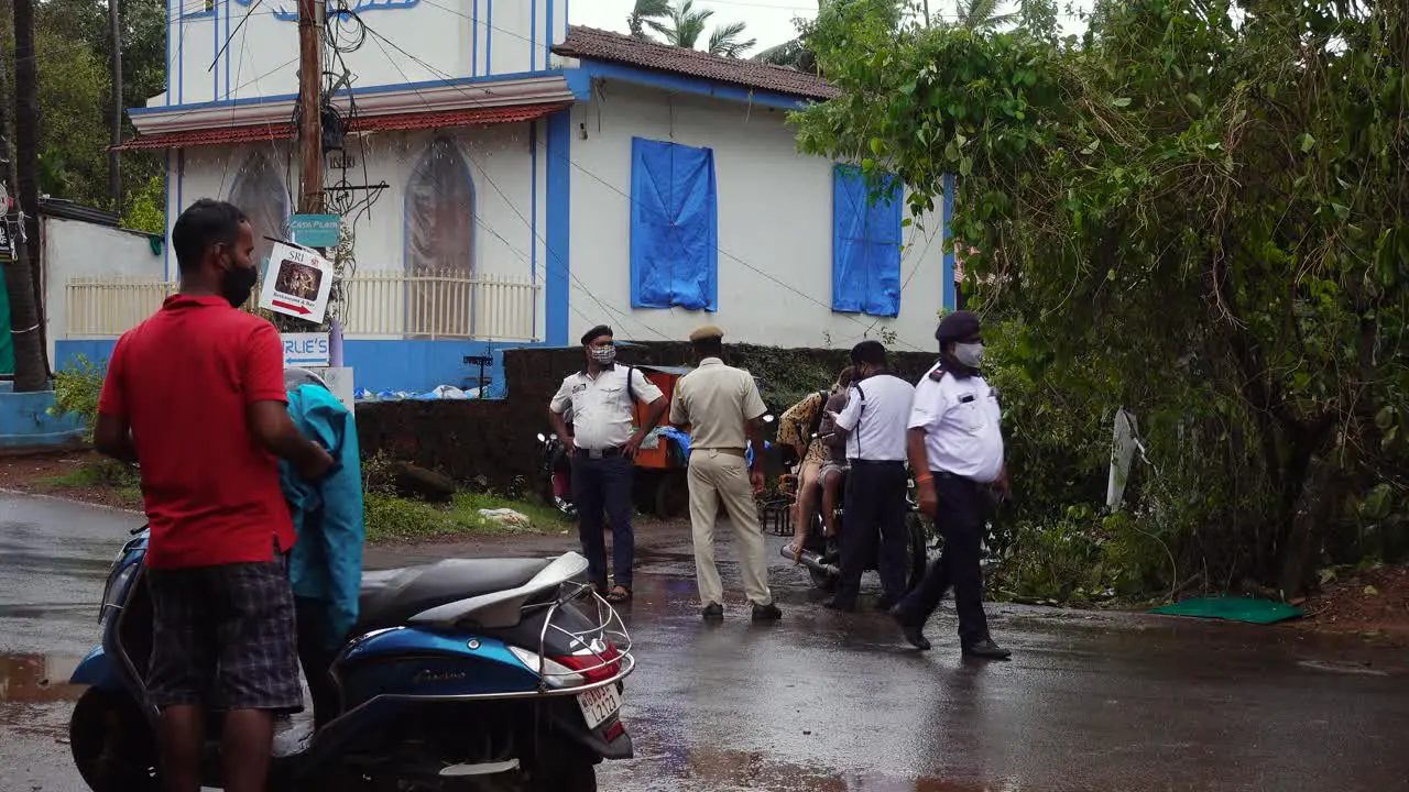 Group Indian Police Officers Stop Motorcycle During Traffic Stop on Busy Road