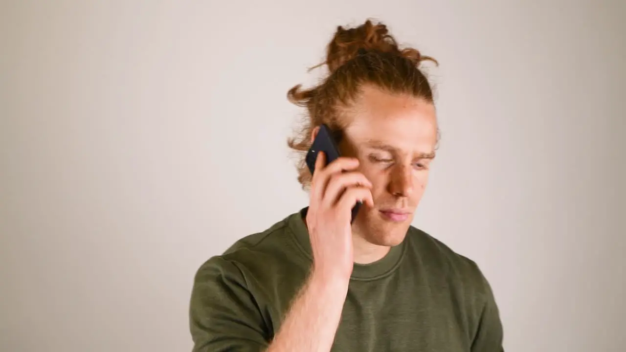 Male calling having an argument and then hanging up the phone