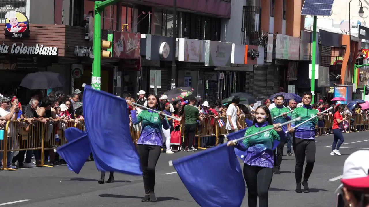 Students Waving Blue Flags During Costa Rican Independence Day Parade in San Jose