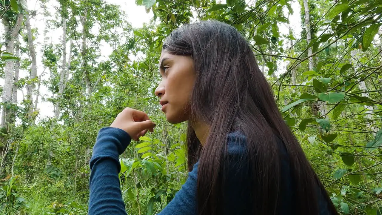 Portrait Of A Woman Ponder In The Middle Of Tropical Forest