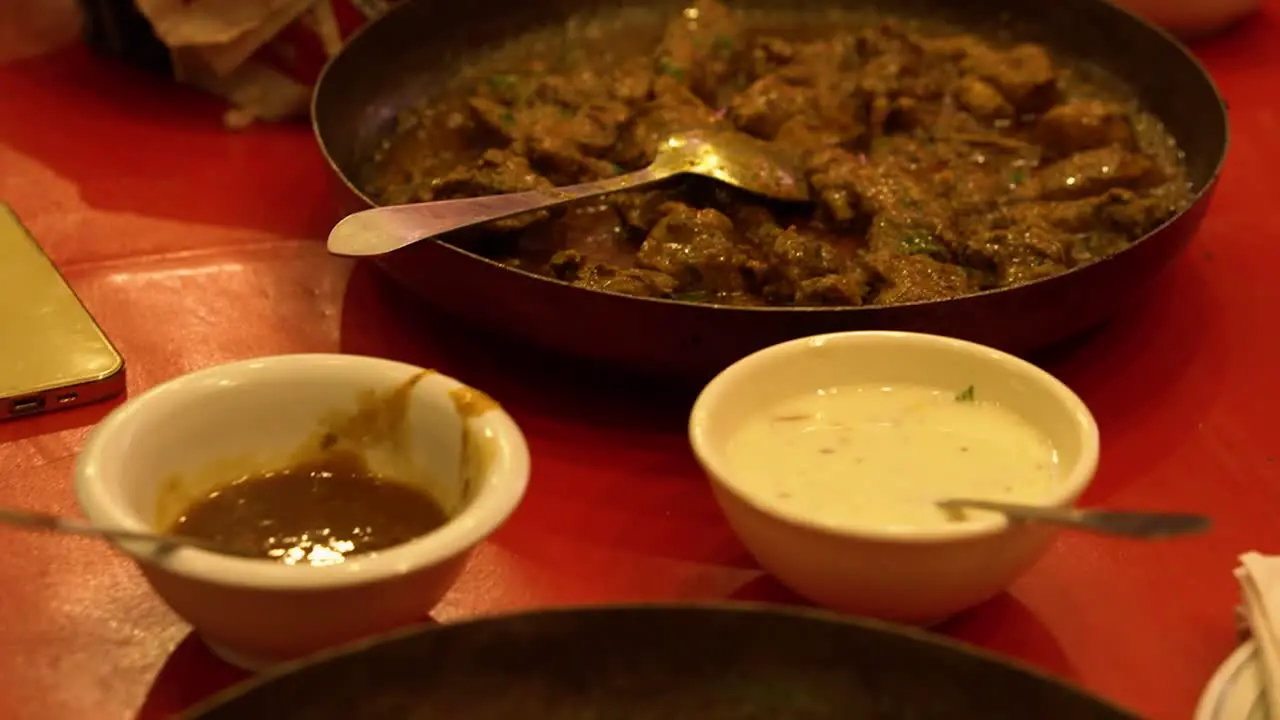 Chicken Karahi traditional recipe of Lamb's Meat made with its own fat tomatoes green chilies and some ginger