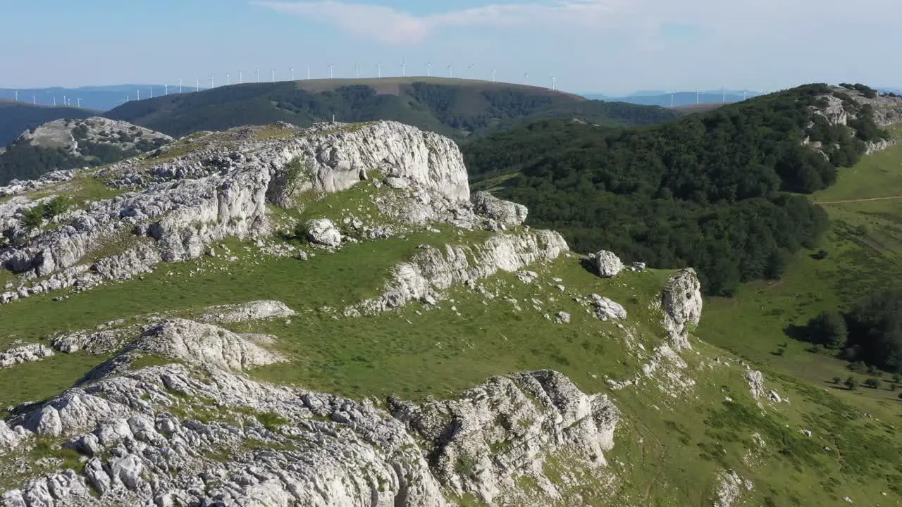 Aerial drone view of a rock mass at the top of a mountain in the Basque Country