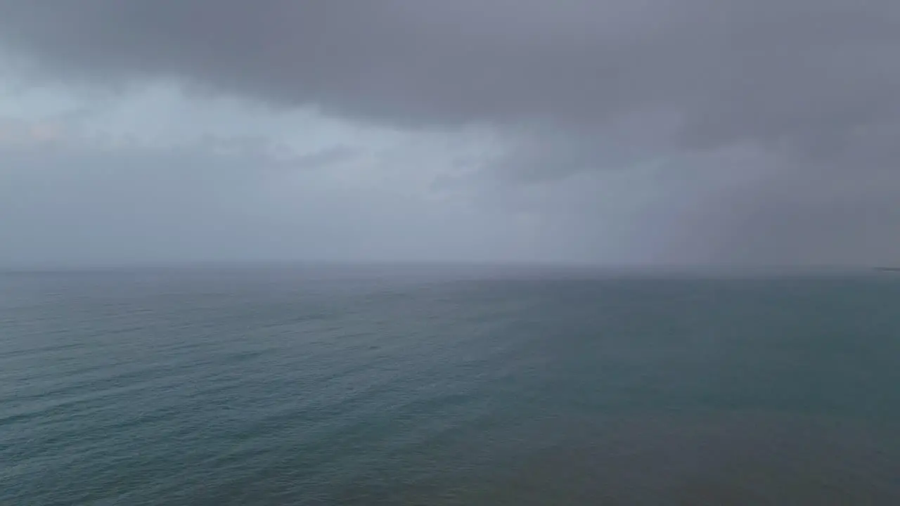 Clouds and rain over the ocean along the Welsh coastal path and coastline