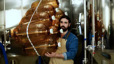 Worker carrying gallons