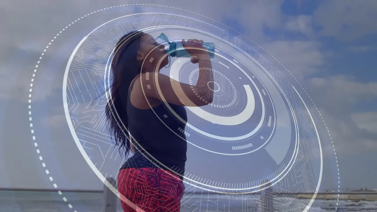 Round scanner processing against african american woman with prosthetic leg drinking water