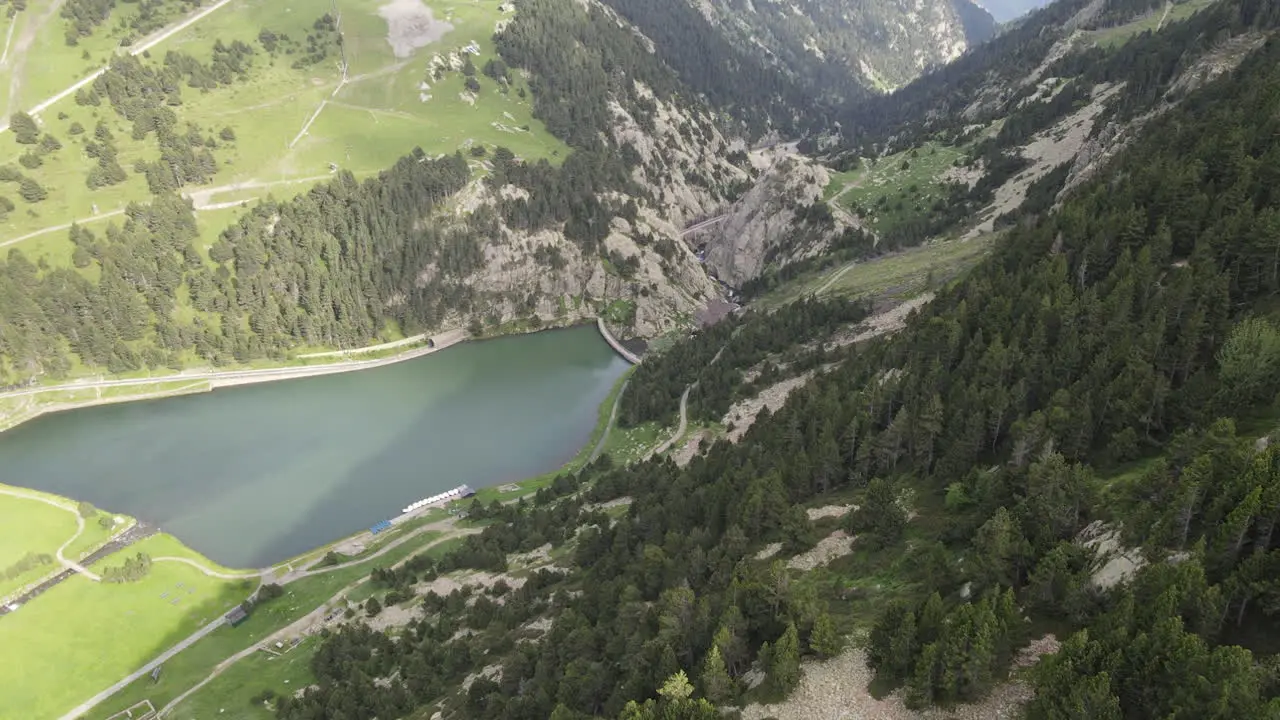 Aerial View Of A Dam Located On A Mountainside In The Pyrenees