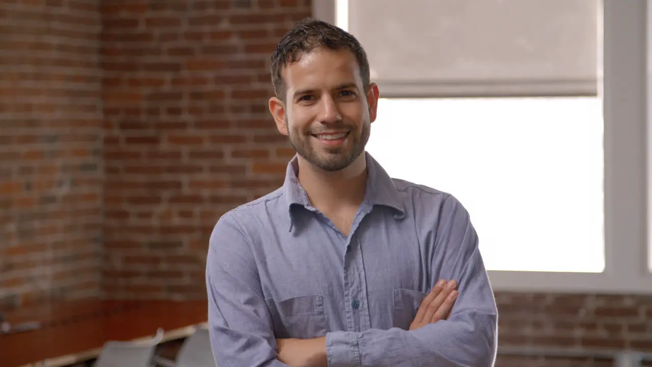 Portrait Of Businessman In Office Shot In Slow Motion