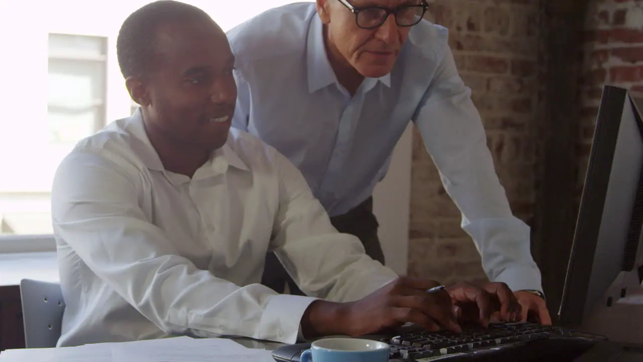 Trainee And Businessman Work On Computer Shot On R3D