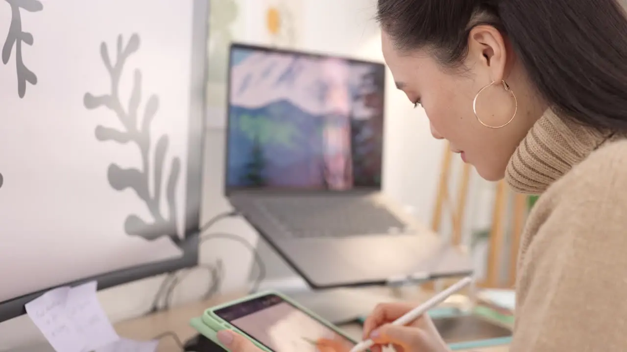 Woman tablet and designer in studio for drawing