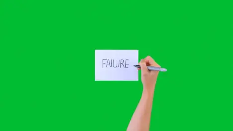 Woman Writing Failure on Paper with Green Screen 01