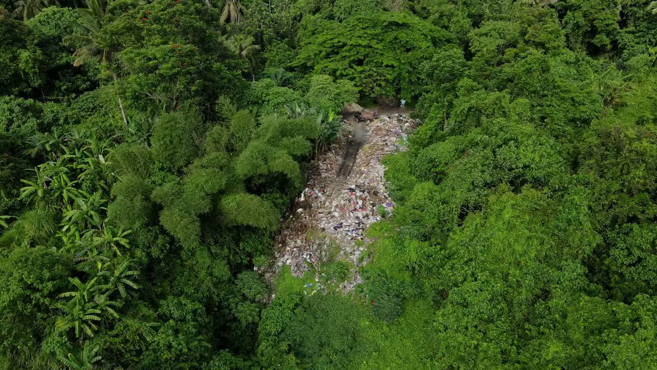 Heap Of Garbage Dump In The Middle Of Rainforest Mountain