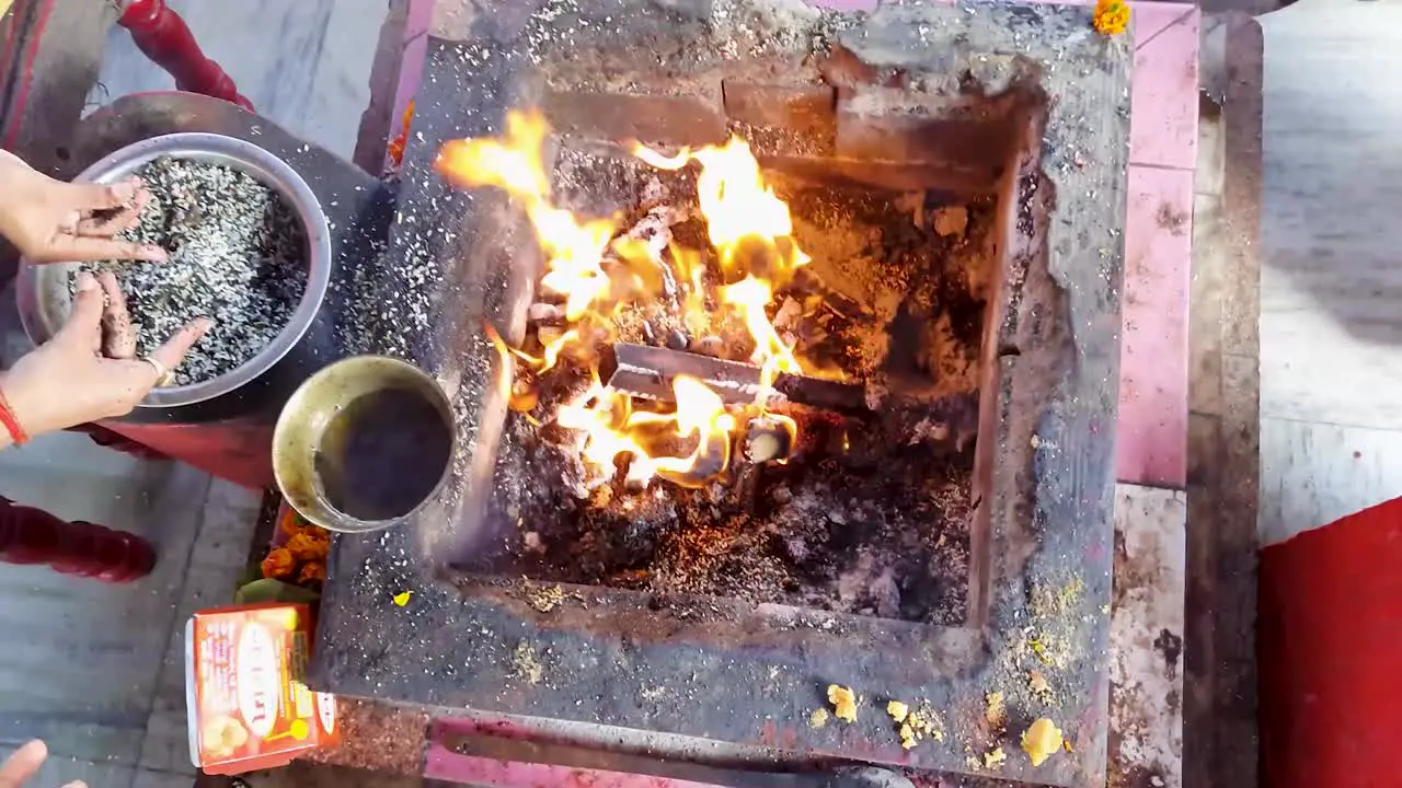 hindu holy rituals with fire from top angle at day video is taken mahavir temple patna bihar india on Apr 15 2022