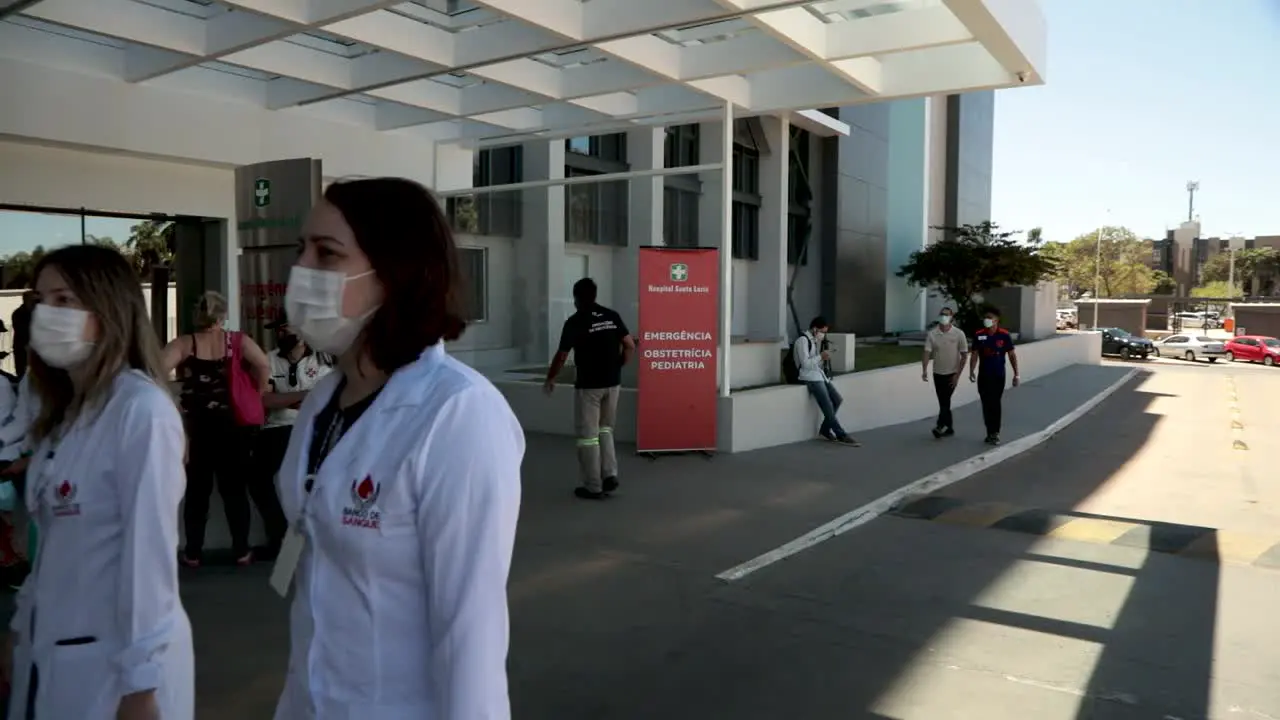 Hospital nurses and doctors return to duty following a fire in the COVID-19 clinic