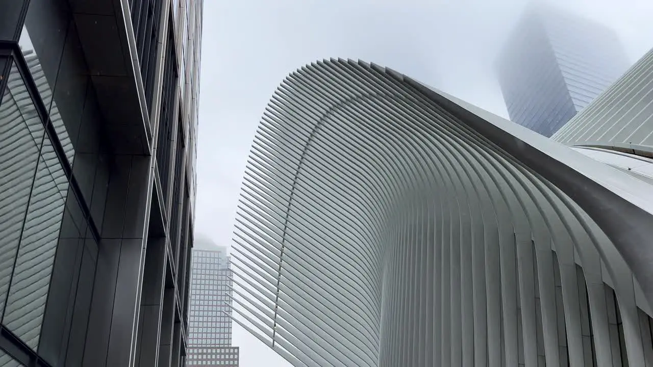 Panning Shot View Of The Oculus Transportation Hub At World Trade Center In New York On A Rainy Day