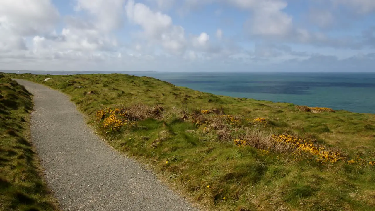 Wide shot of coastal path from Lower Penhallic Tregatta