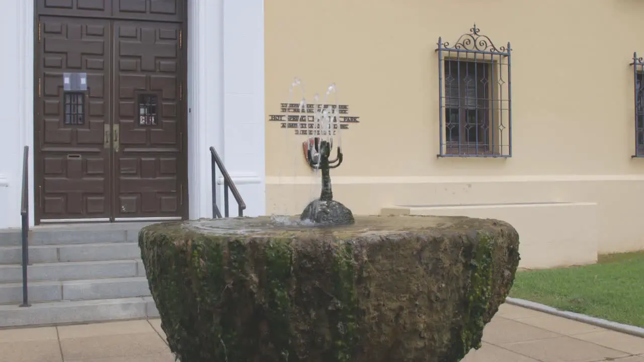 Hot spring water fountain flowing in front of Hot Springs National Park Administration building