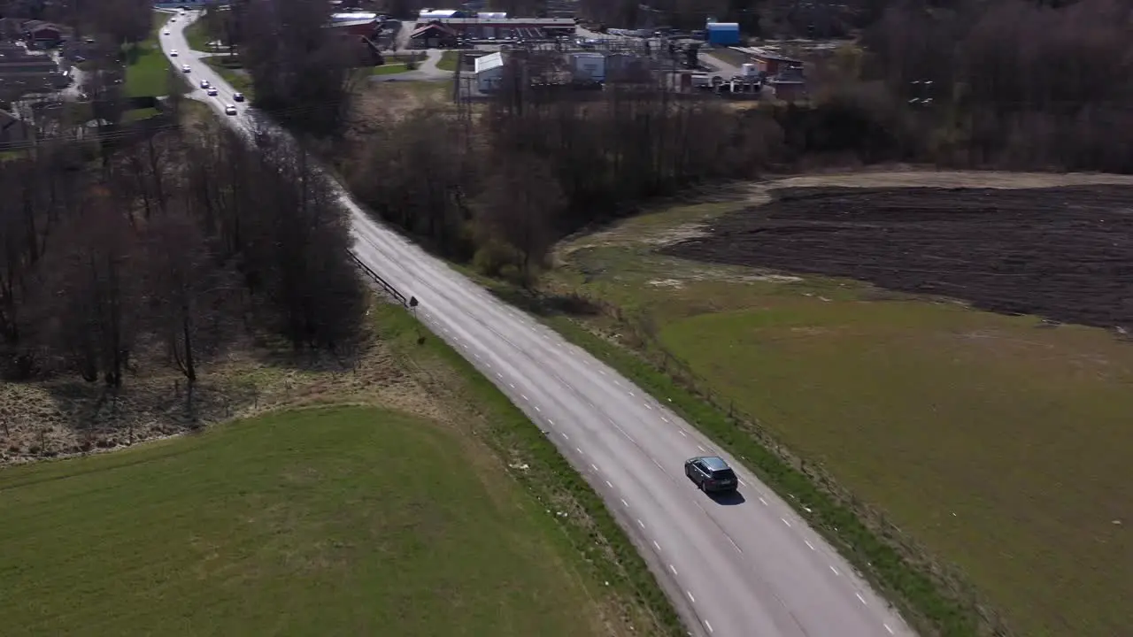 Car driving through Countryside in Sunny Sweden outside Gothenburg