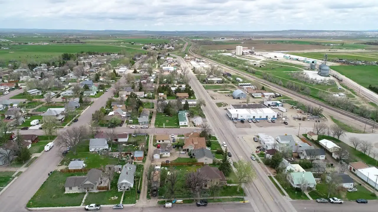 The historic town of Wheatland Wyoming in 2021 springtime green grass after snow melt and rains