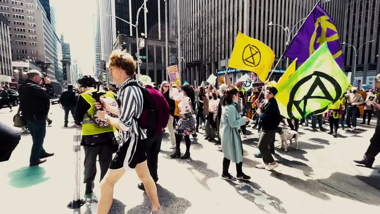 Extinction Rebellion demonstration on the streets of New York's Manhattan in spring sunshine