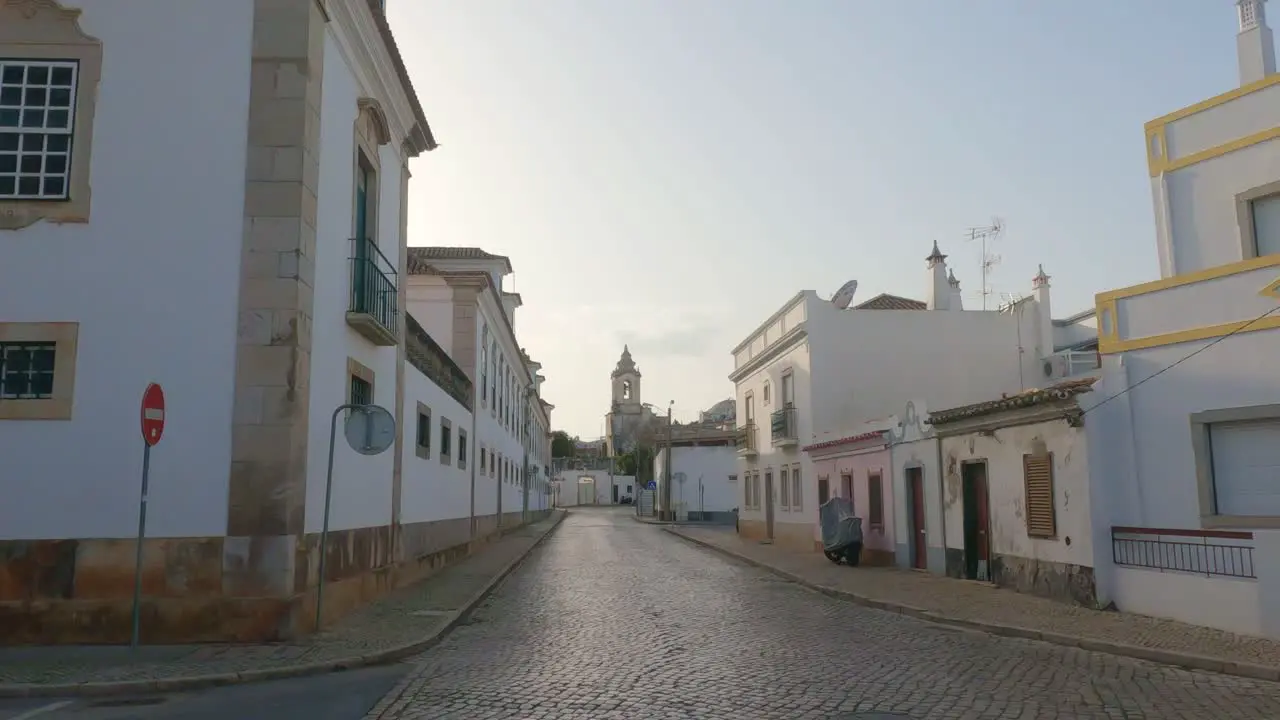 Late evening sunshine on a street Tavira algarve Portugal