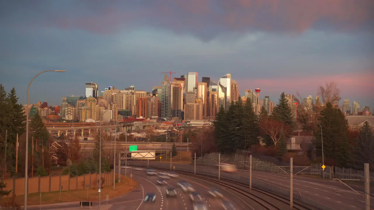 Colourful warm sunrise or sunset timelapse in the city during the fall in October in Calgary Alberta Canada