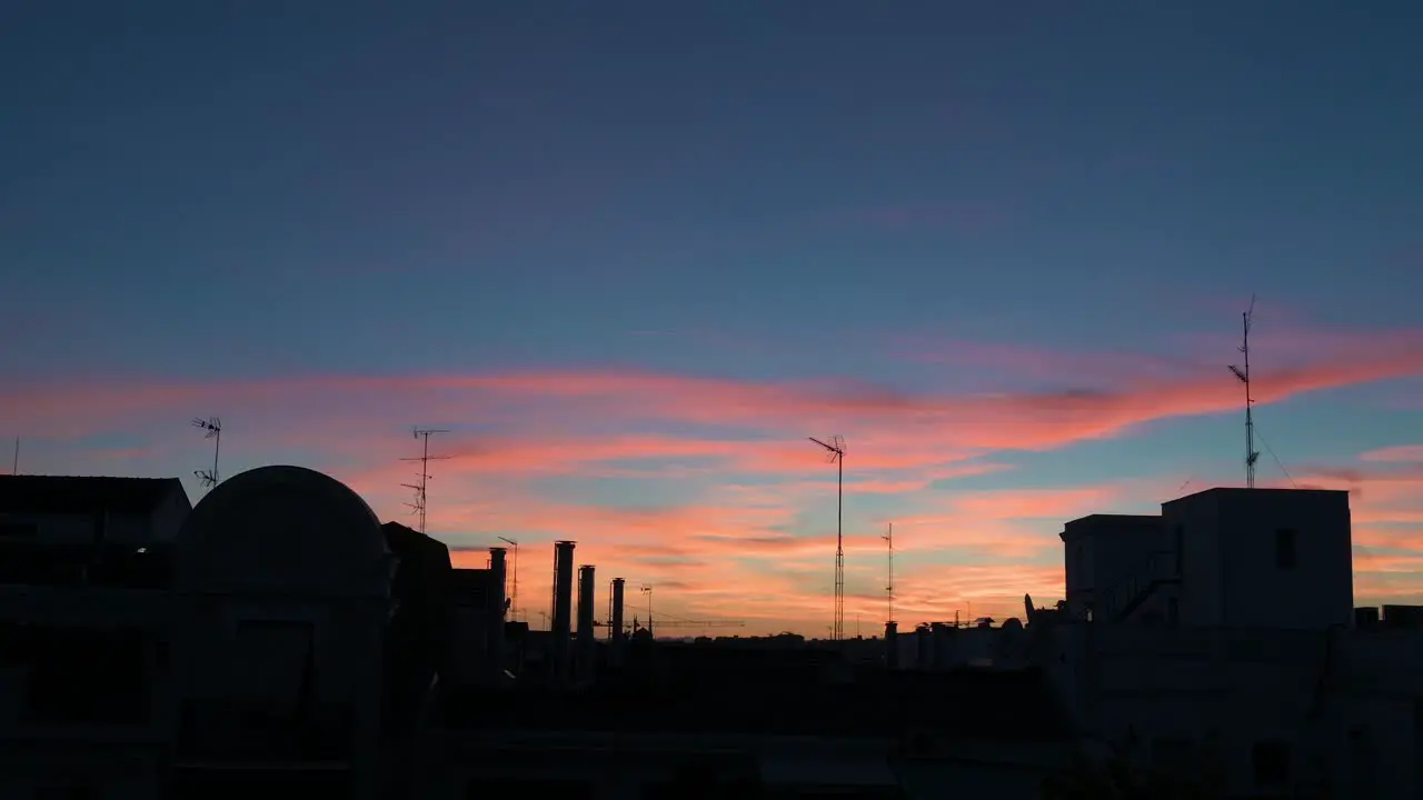 Beautiful soft color palette Summer sunset seen in downtown Madrid Spain