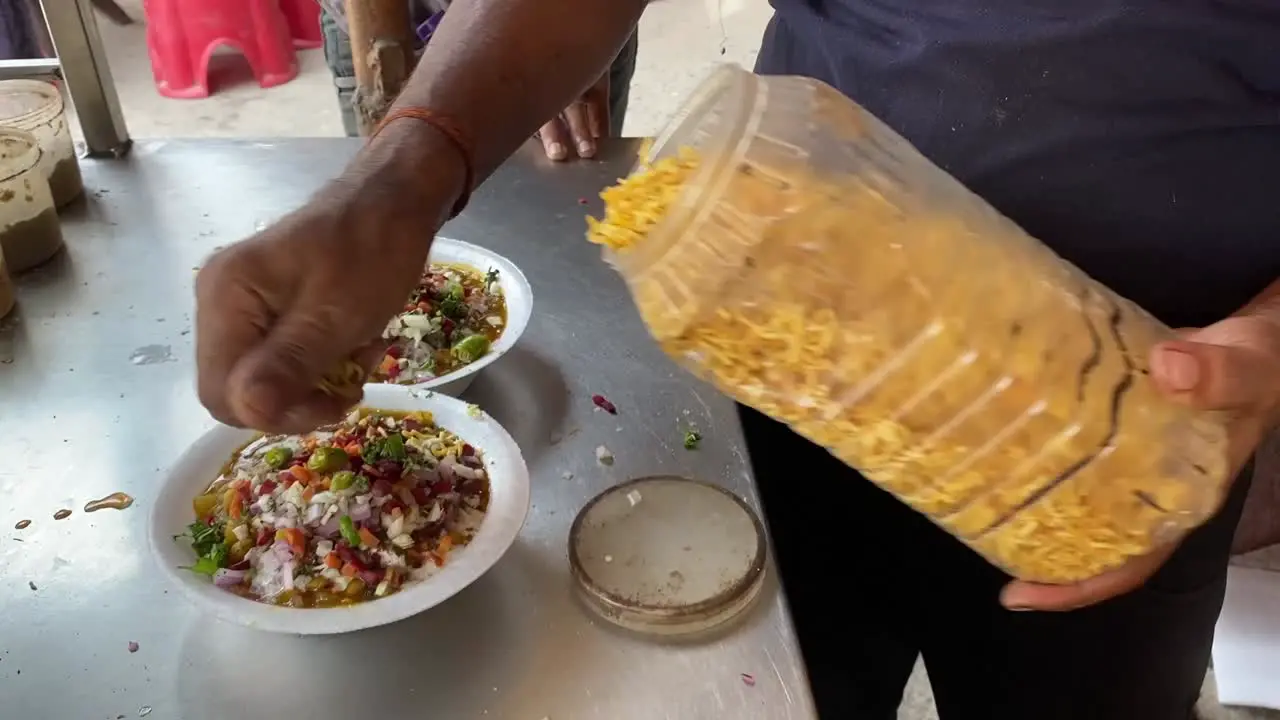 Indian Pakistani Street Food Samosa Chaat Chana Chaat with Samosa and chutney yoghurt salad onion healthy sauce