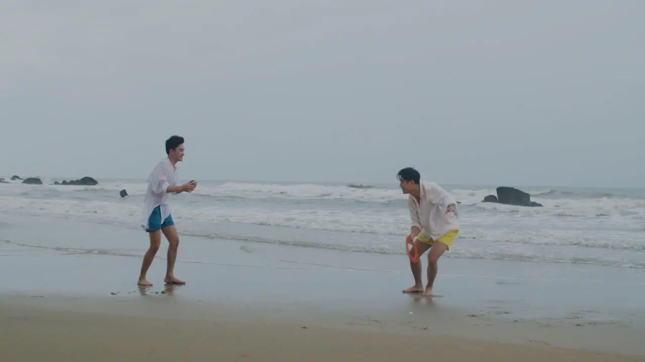 Couple playing frisbee