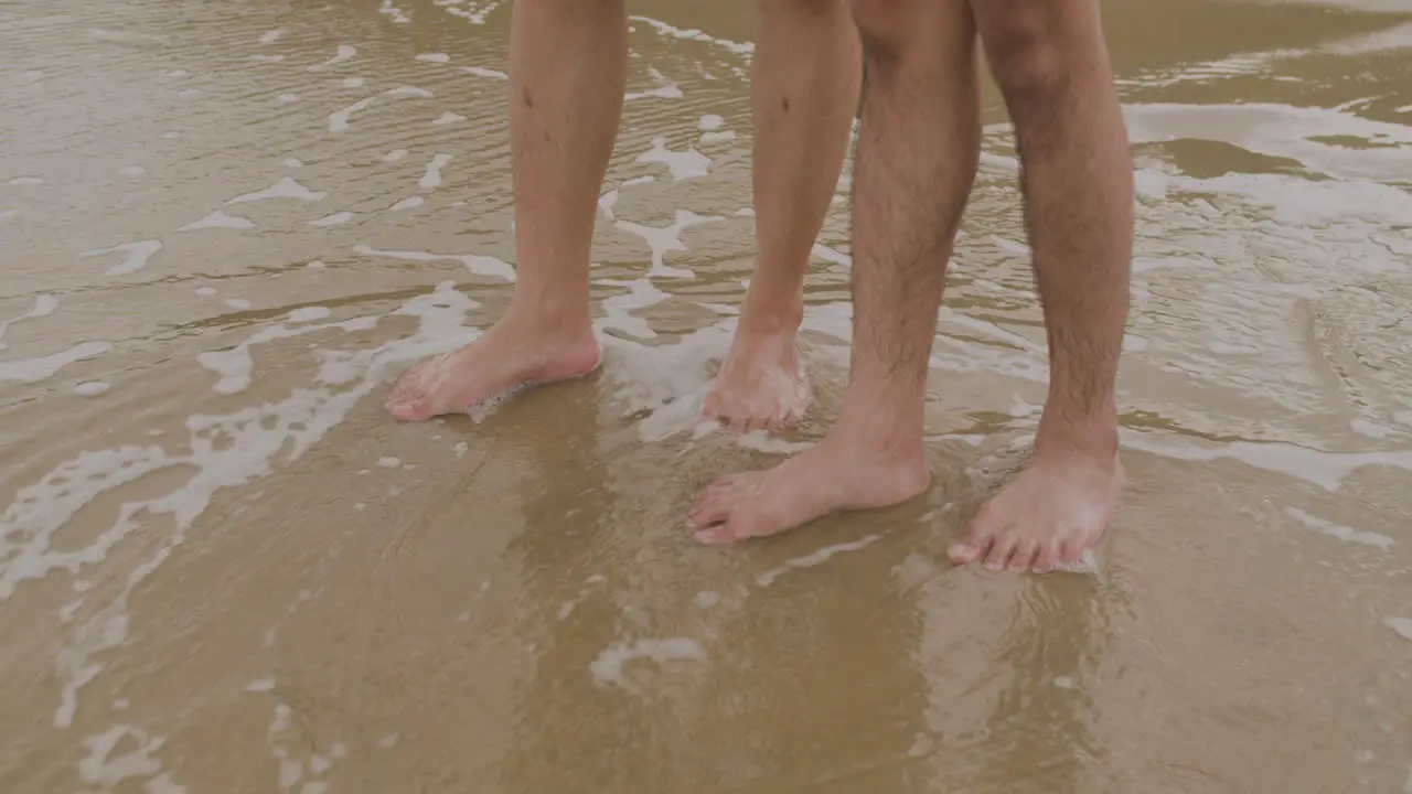 Couple standing at the shore