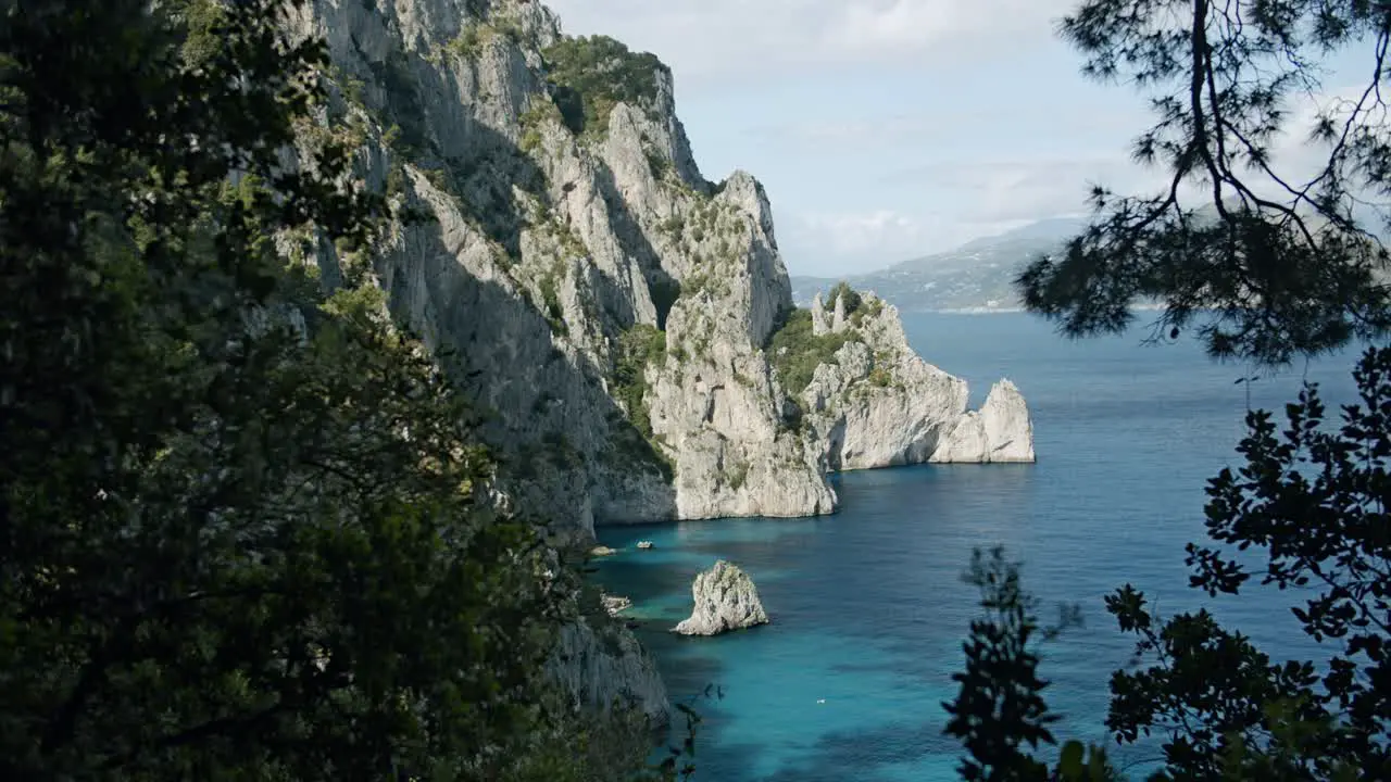 Beautiful view of some cliffs in the Island of Capri in Italy during a sunny evening in Spring