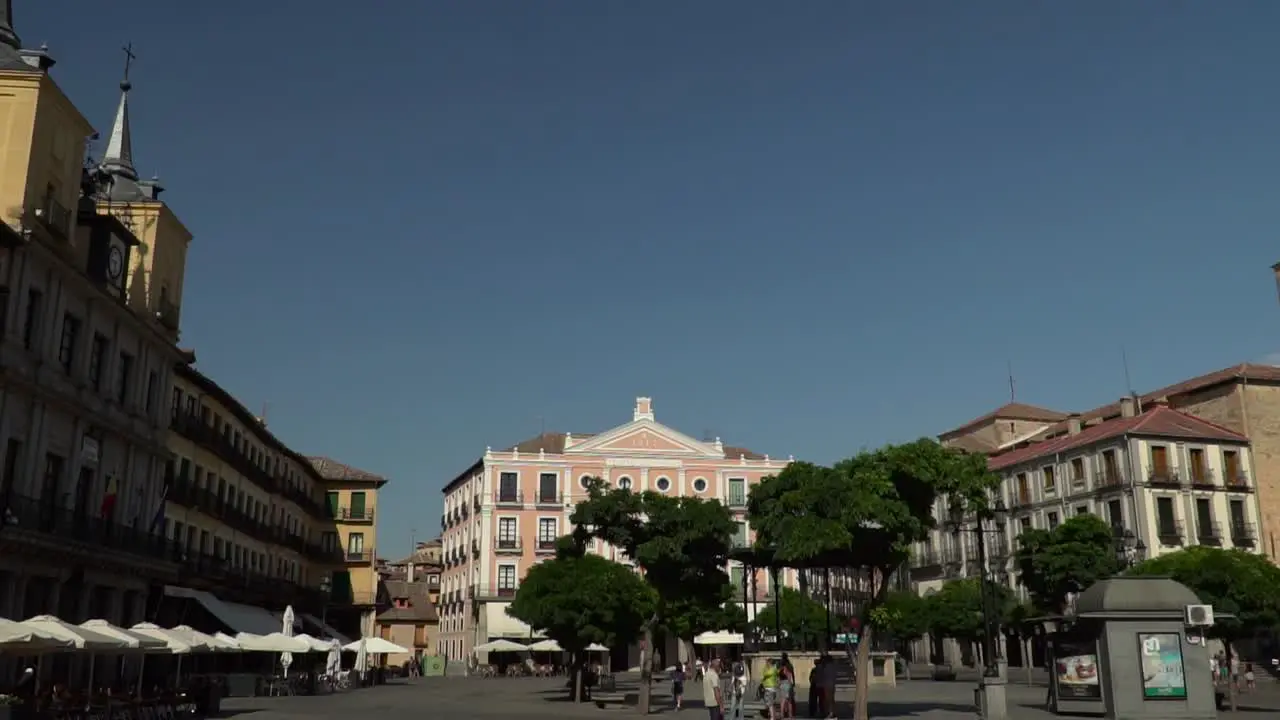 Right moving dolly around Segovia Main square on sunny day SLOW MOTION