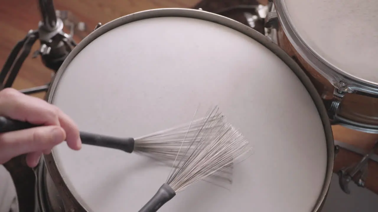 Jazz Drummer Plays Snare Drum With Brushes Overhead In Slow Motion