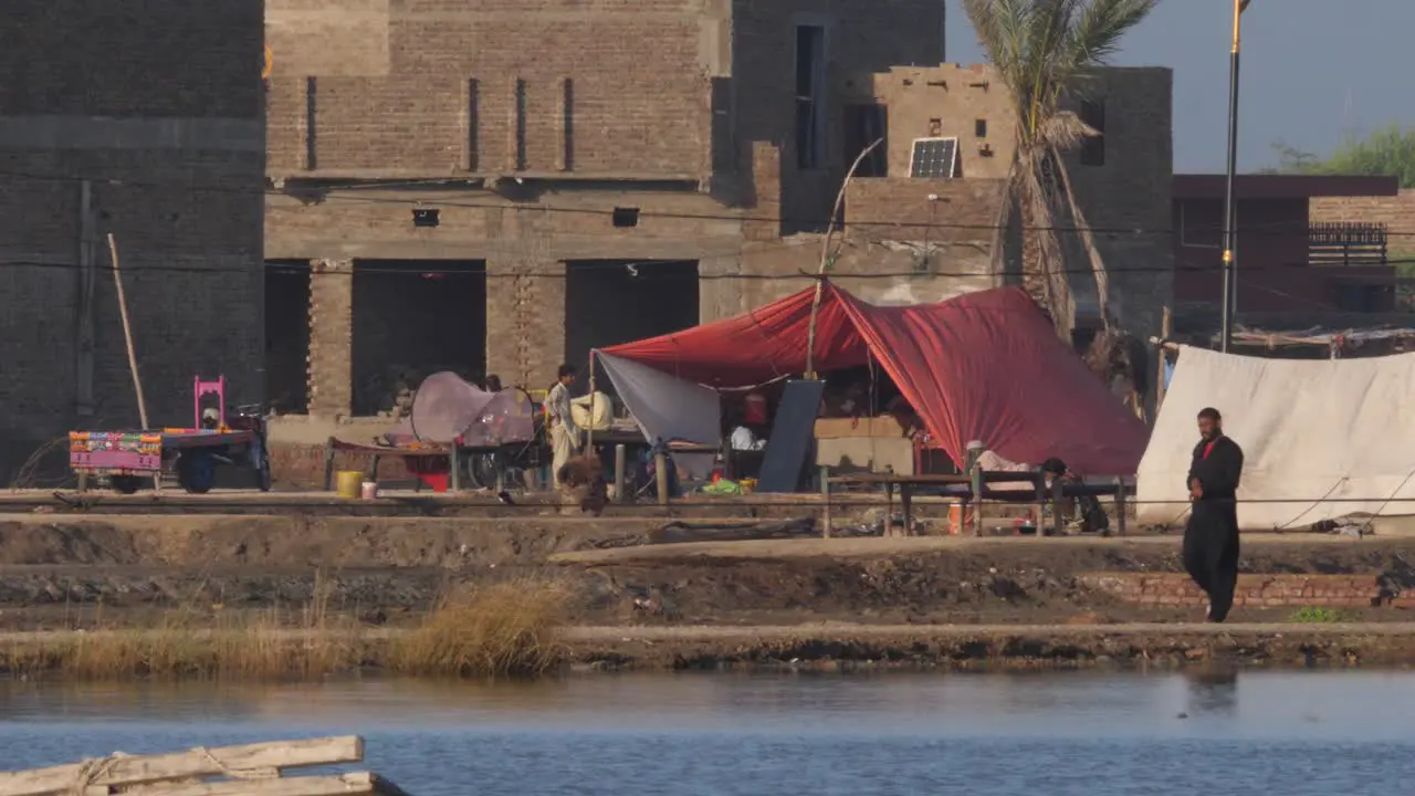 Across River View Of Makeshift Camp Made By Local Due To Flooding In Sindh Pakistan