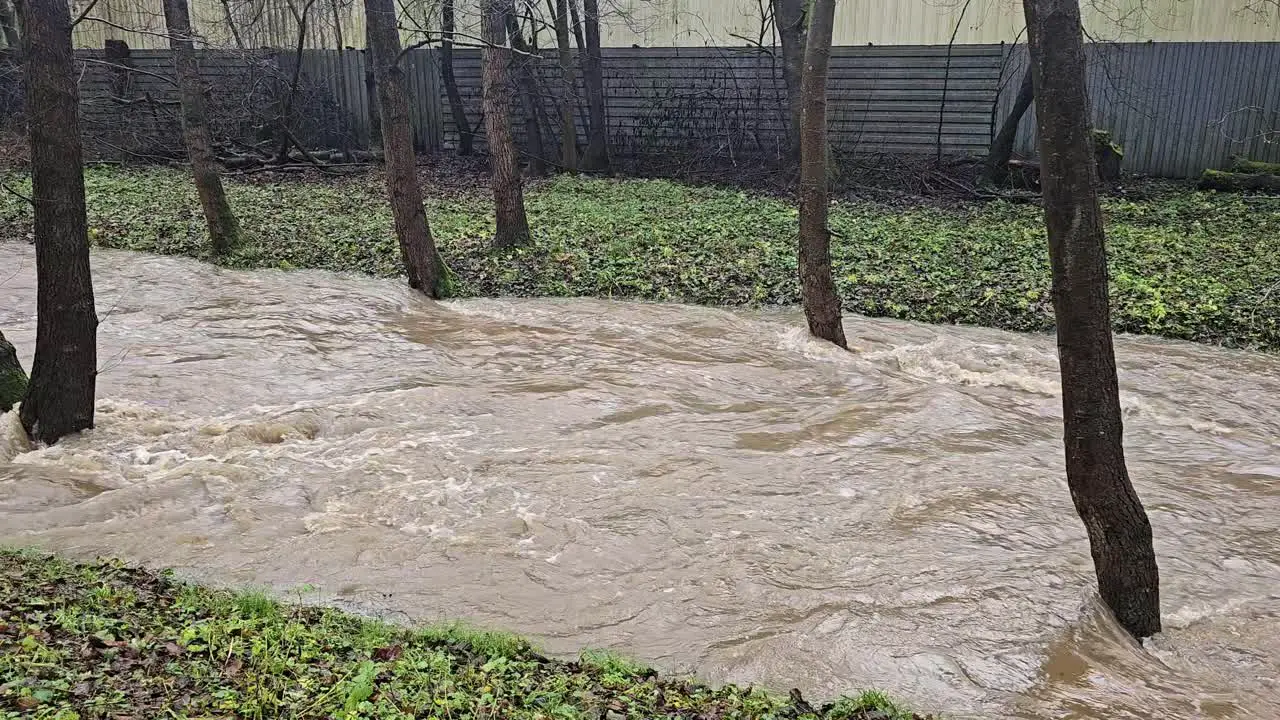 Mass of water in a storm The raging river after extreme weather