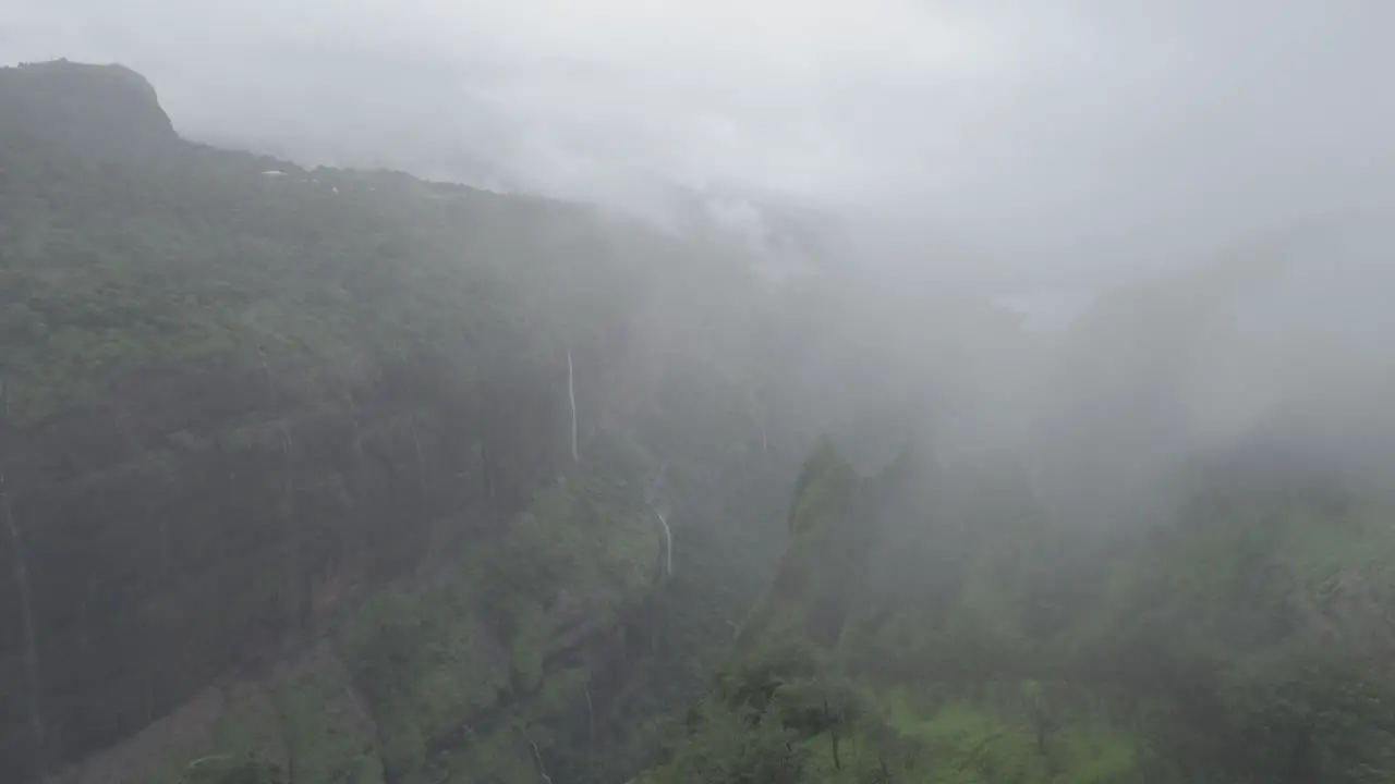 A cinematic aerial drone view of a lush green rain forest on the hills of western ghats in Andharban forest of Pimpir region in Maharashtra a popular trekking destination for local tourists