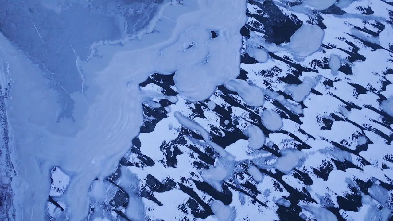 Aerial footage gliding over the icy expanse of Lake Michigan