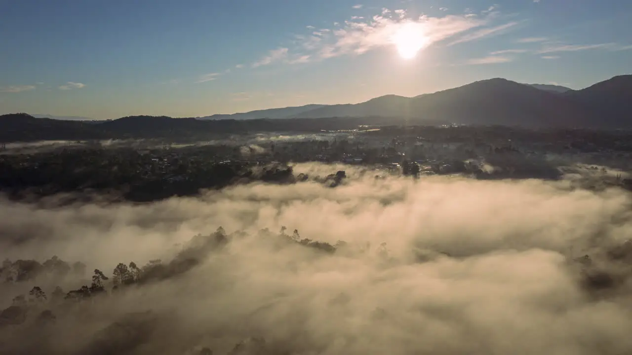 Epic morning timelapse with the sun rising through the fog stunning horizon dreamy view in the morning