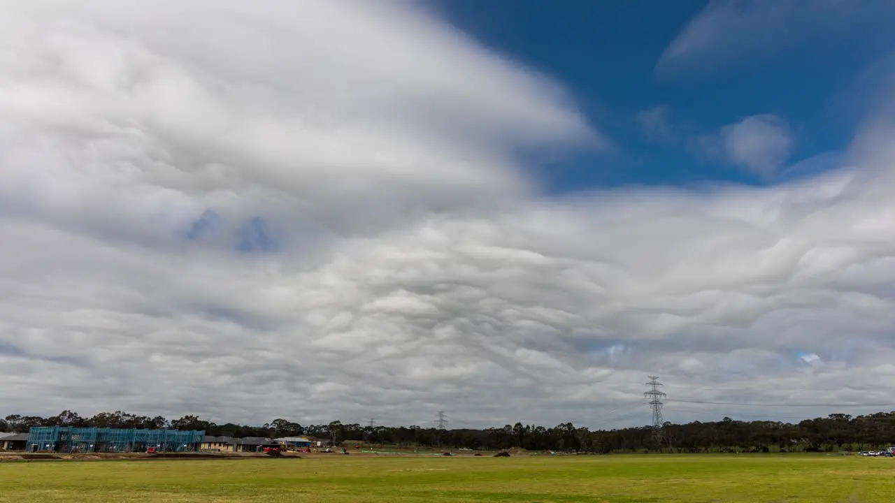 Time lapse of rare Asperitas clouds rolling across an oval and building development at Mount Barker