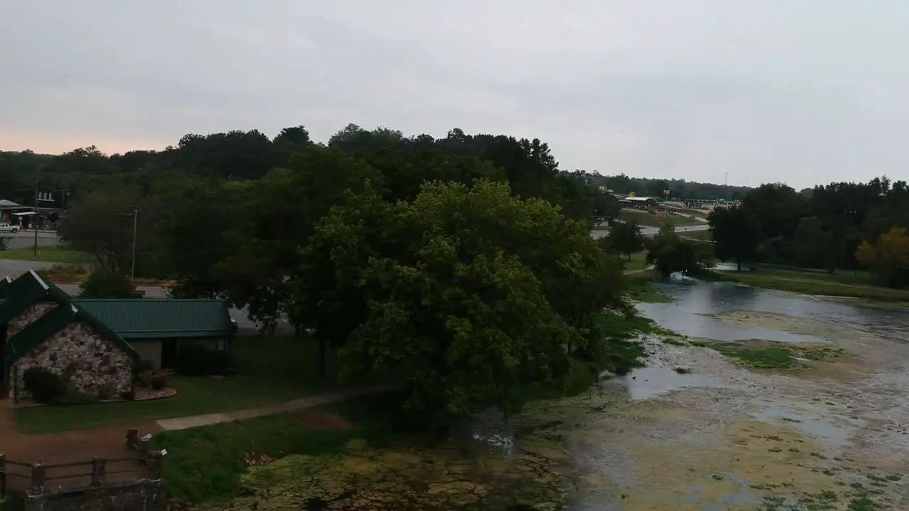 pond scum flyover near a park 4k 30fps drone