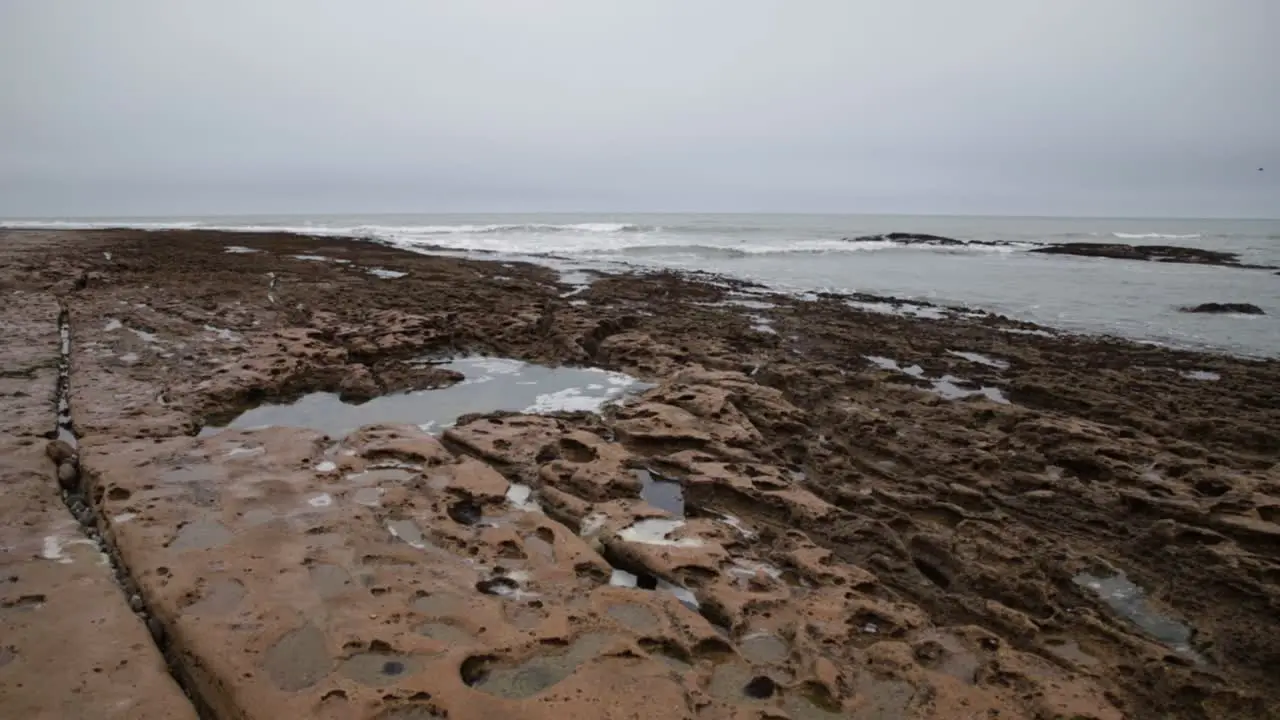 A beach with interesting rock formations just outside Swakopmund on a cloudy and misty day