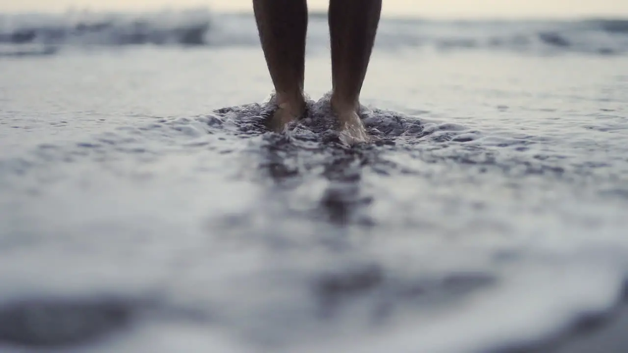 Washing away sins barefeet Benijo Tenerife Spain