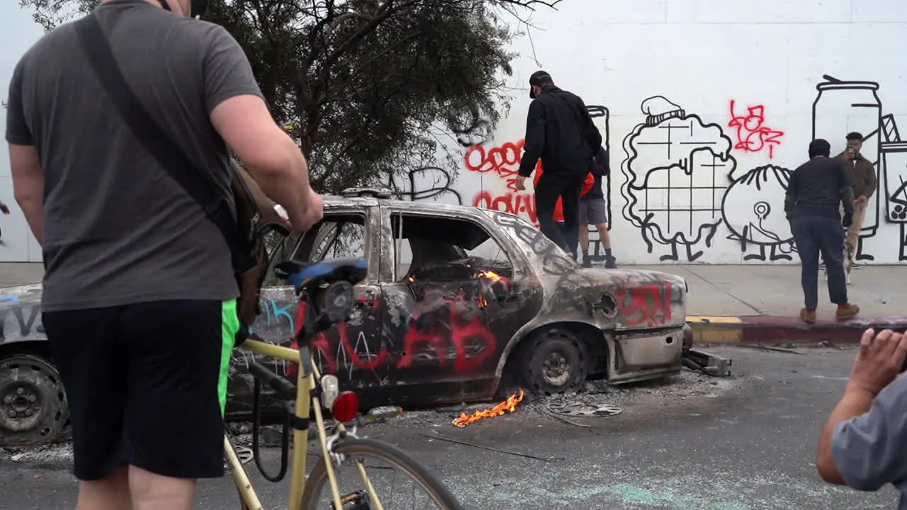 Demolished Burning Car on Street of Los Angeles at Black Lives Matter Protest